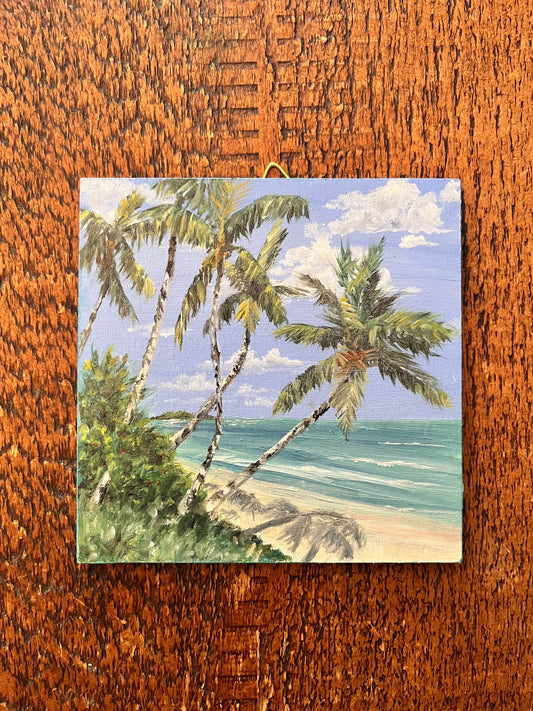 Beach scene in oil on a birch panel